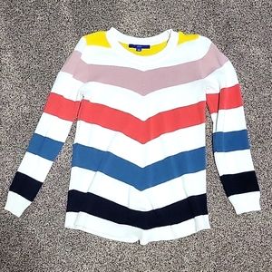 A lightly used APT.9 sweater size small